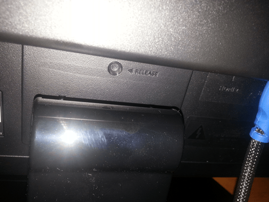 The stand release button on the BenQ RL2455HM.